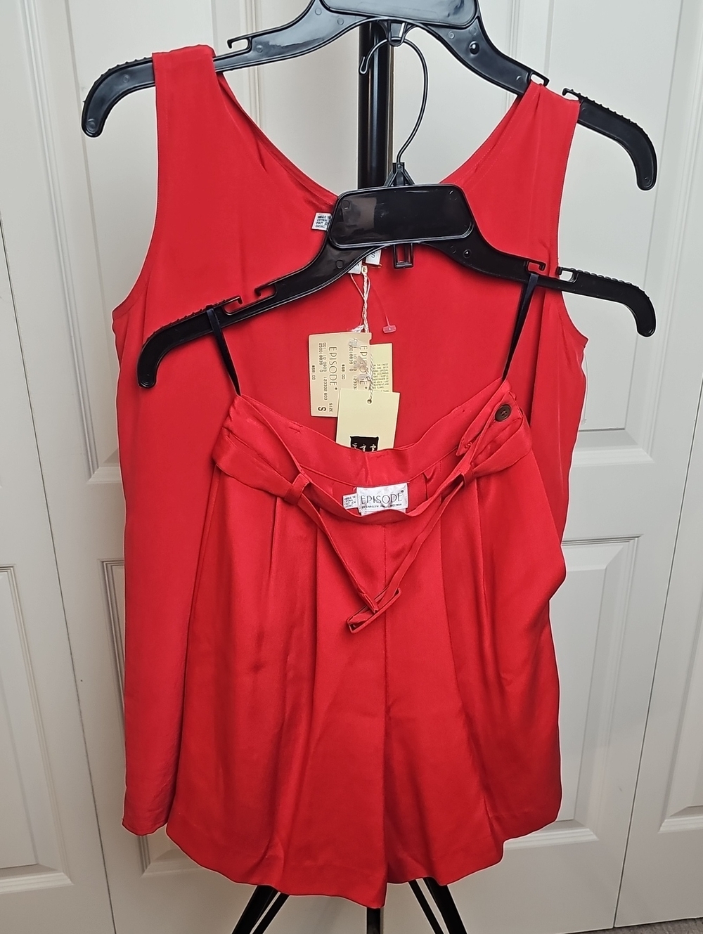 Red Sleeveless Blouse And Red Shorts